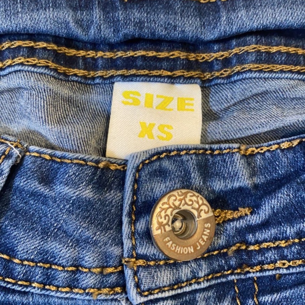 Vintage Adorable ripped sequenced skinny jeans